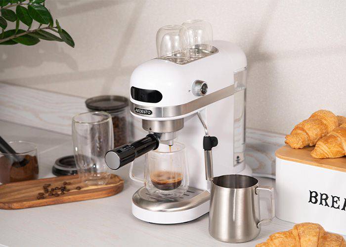 Ardesto YCM-E1500 coffee machine with stainless steel finish and compact design, suitable for home brewing espresso and coffee.