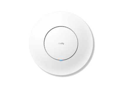 Cudy AP1300 access point mounted on wall, showing sleek design and antennas for Wi-Fi connectivity.
