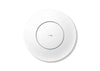 Cudy AP3000_P access point mounted on a wall, showing its sleek design and multiple antennas for wireless network coverage.